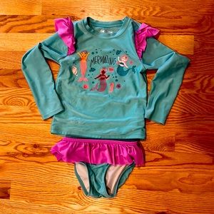 Two piece long sleeve swim top and bottom in really good condition!